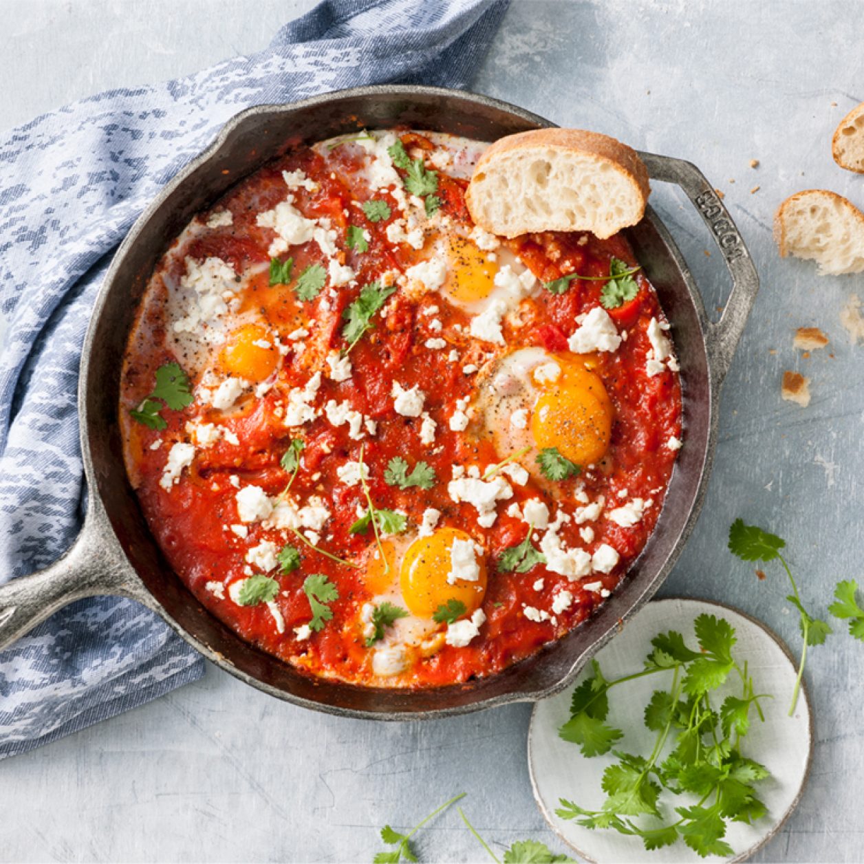 Tomato-Poached Eggs with Feta | Savory