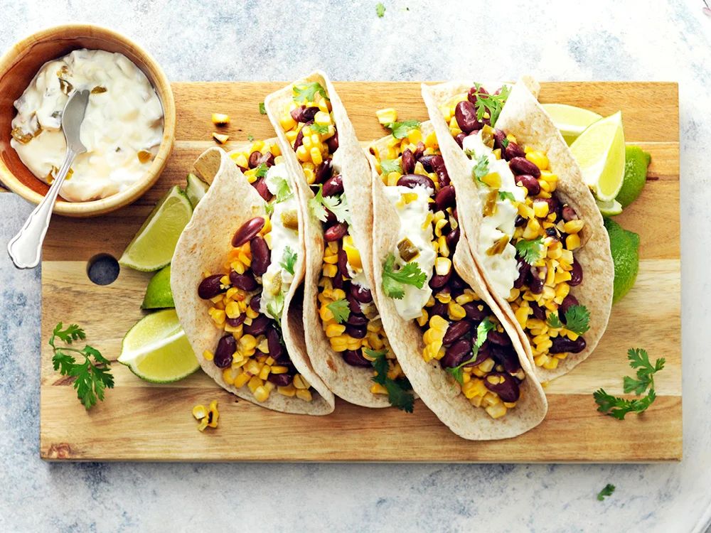 Grilled Corn and Bean Tacos with Green Chile Crema | Savory