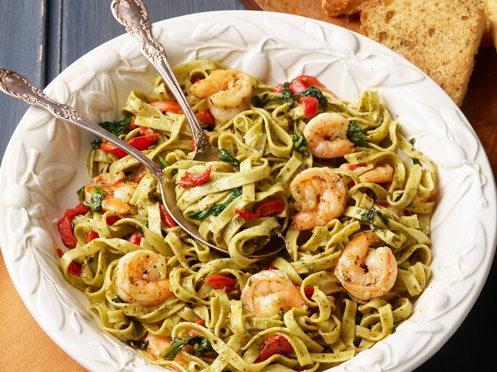 Pesto Shrimp and Fettuccine with Roasted Peppers and Spinach | Savory