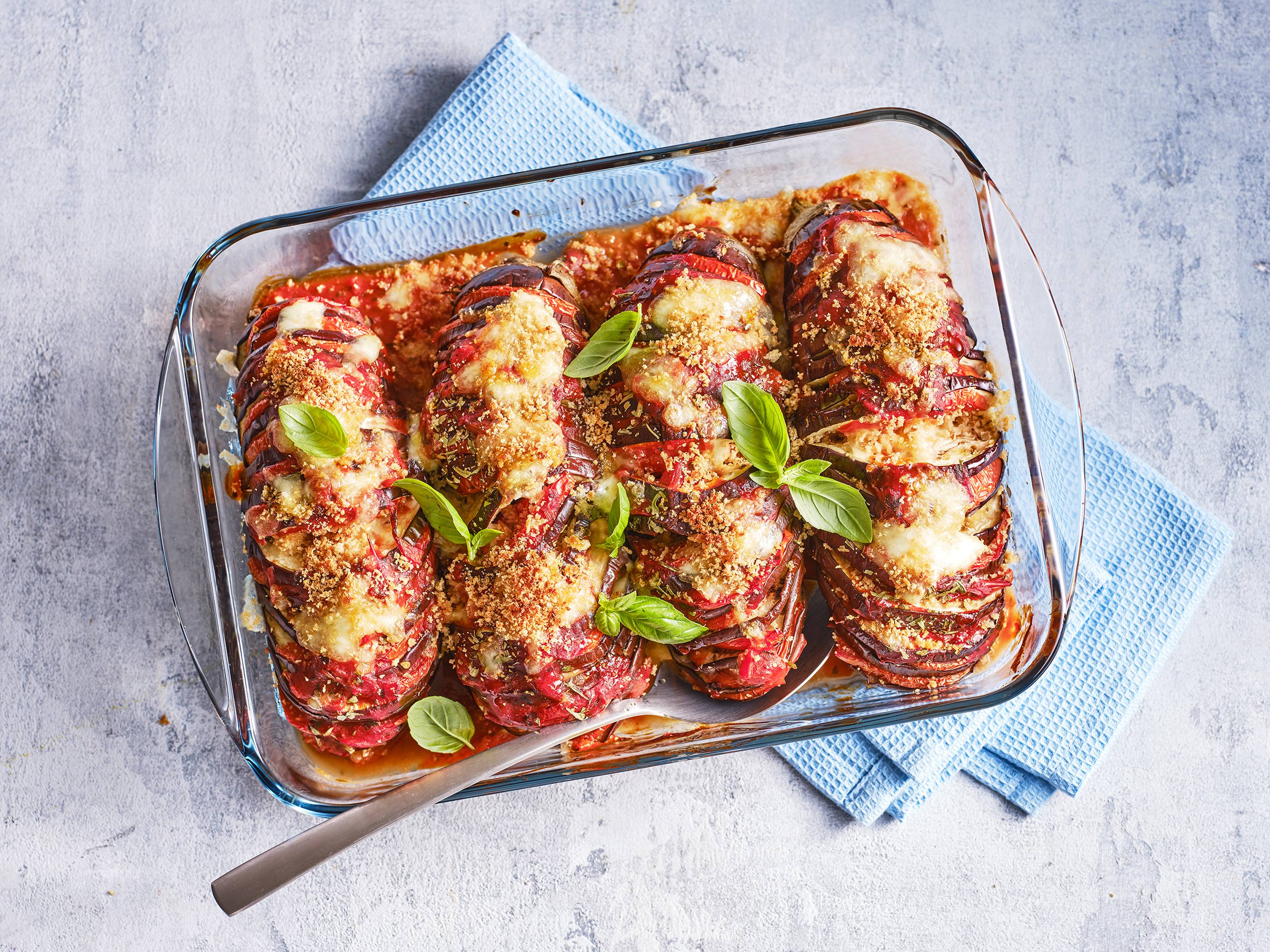 https://www.savoryonline.com/app/uploads/recipes/238496/hasselback-eggplant-parm.jpg